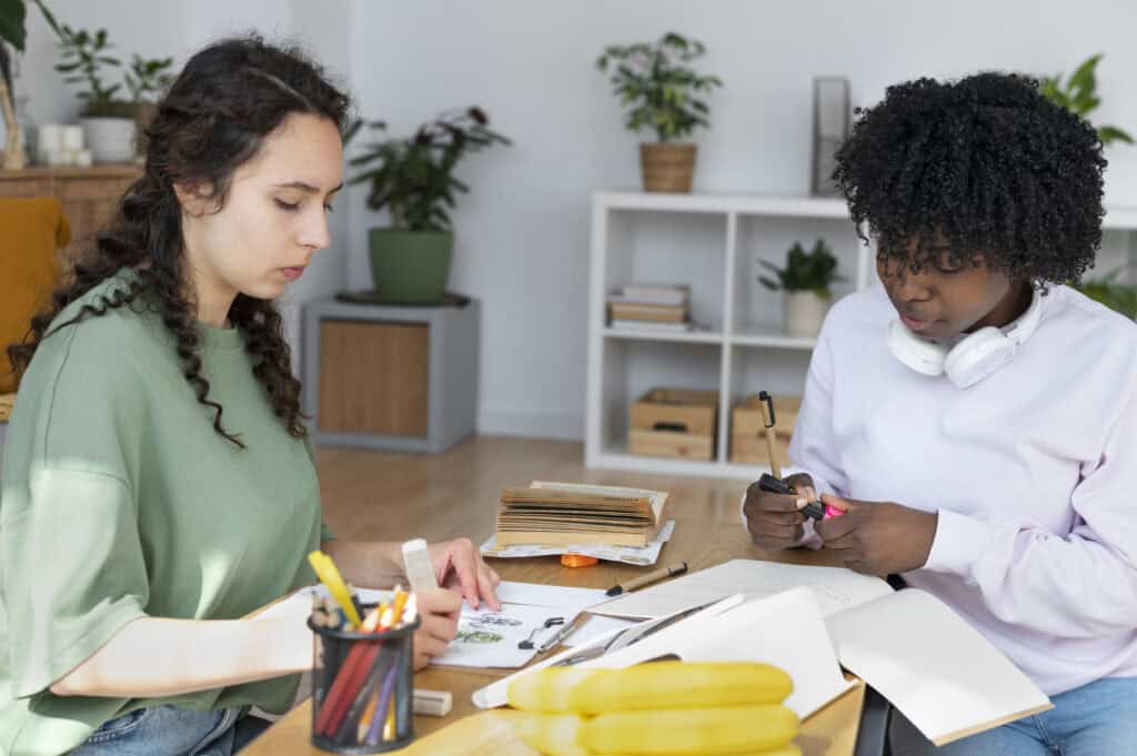 A teacher helping her student learn.